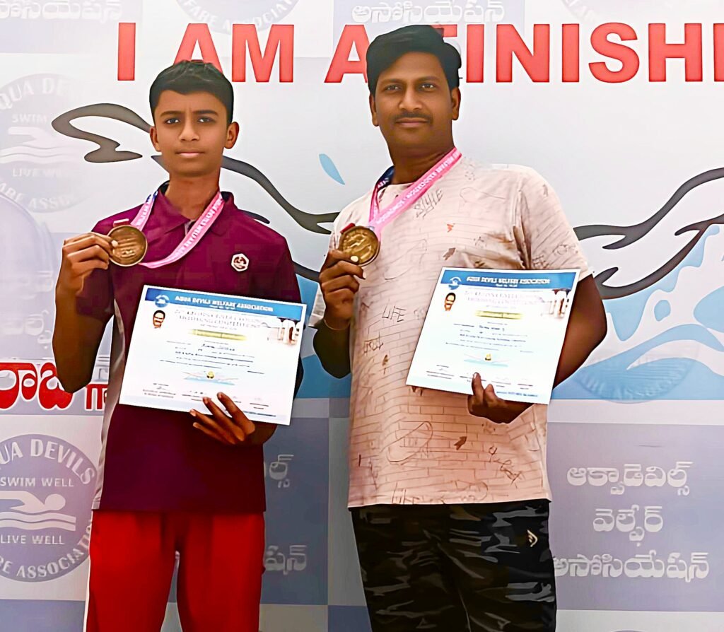 ఈత పోటీల్లో తండ్రి తనయుల ప్రతిభ..